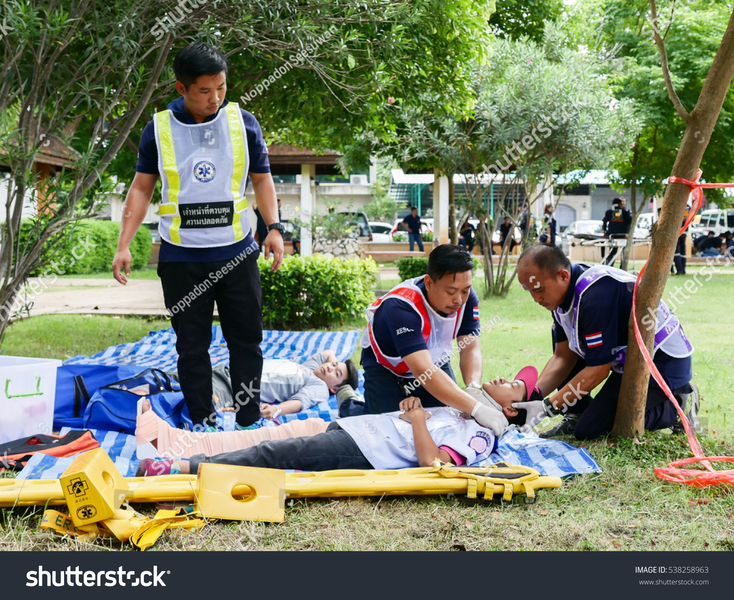 Lampang Thailand- September 16 2016 Emergency medical team practice for saving and packaging trauma patient at park in Lampang Thailand September 16 2016 Lampang Thailand- September 16 2016 Emergency medical team practice for saving and packaging trauma patient at park in Lampang Thailand September 16 2016
