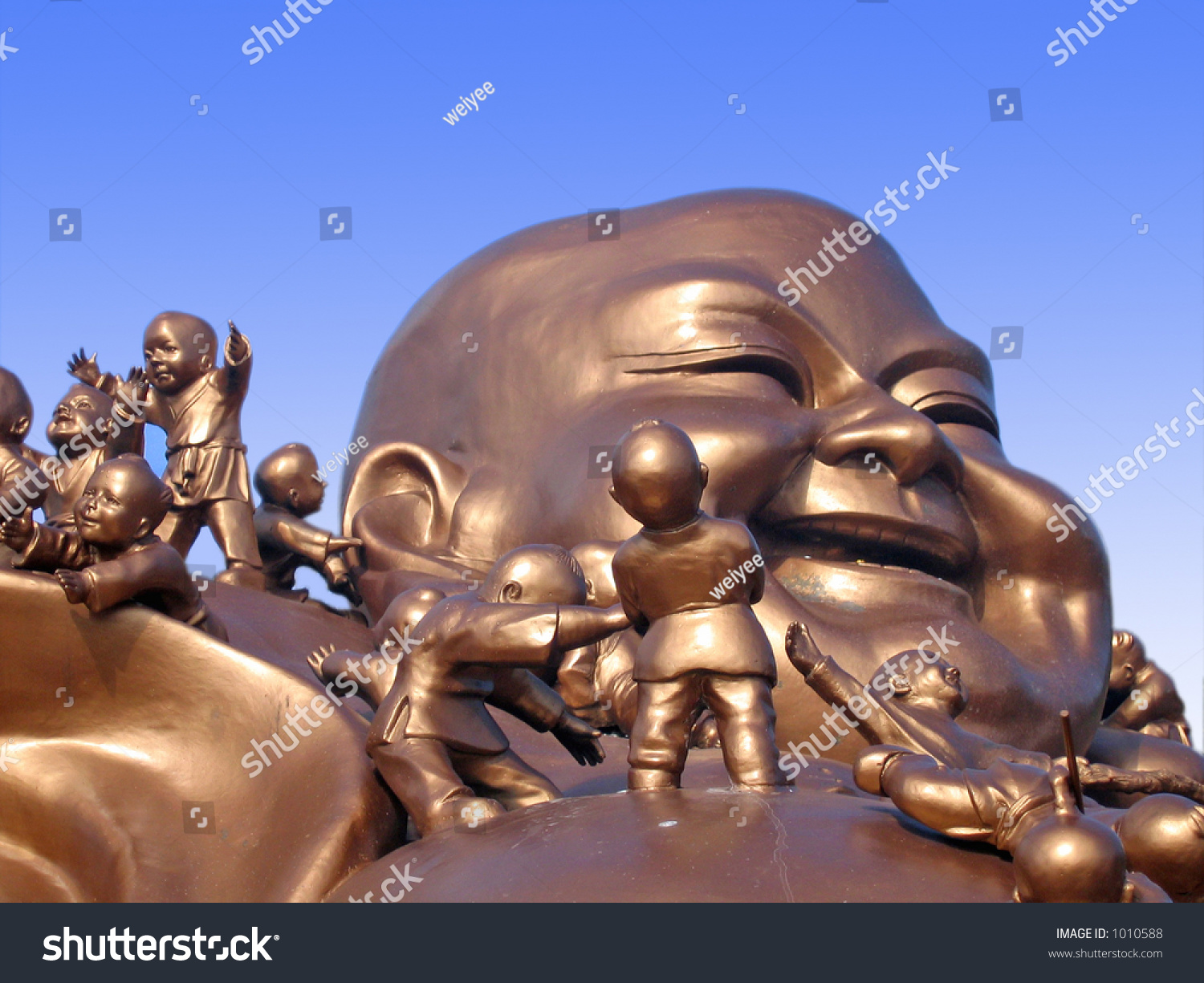 Laughing Buddha With Playful Kids Stock Photo 1010588 Shutterstock