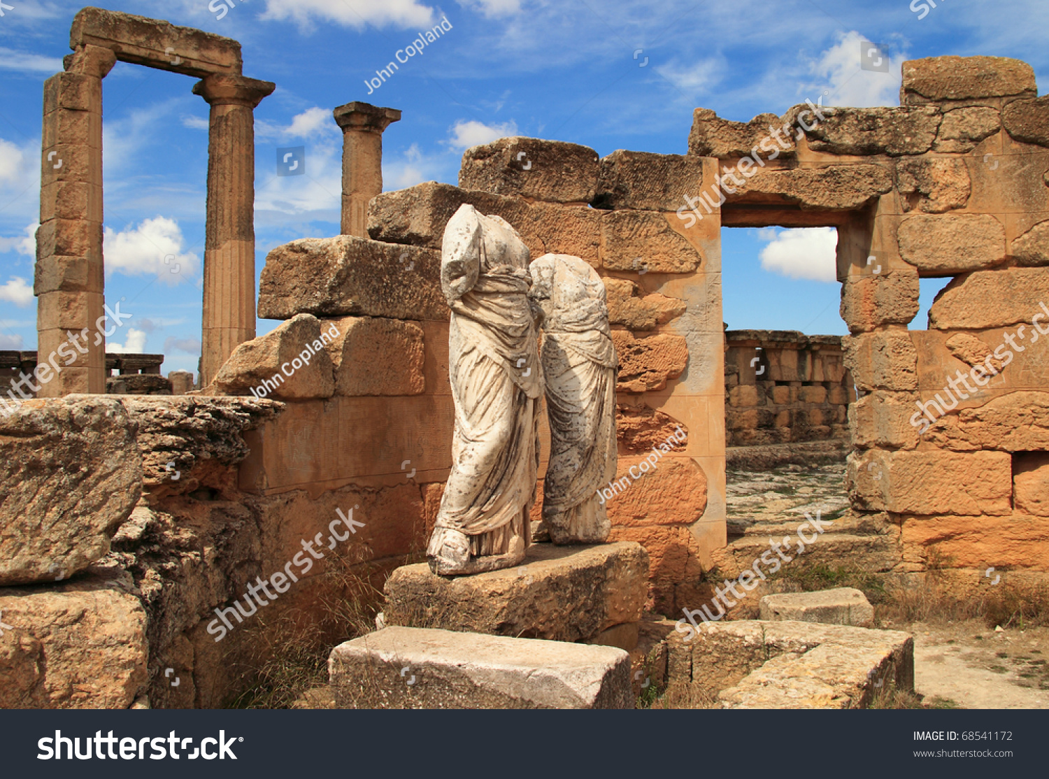 stock-photo-libya-cyrenaica-cyrene-ancient-ruins-headless-stone-statue-of-woman-unesco-world-heritage-site-68541172.jpg