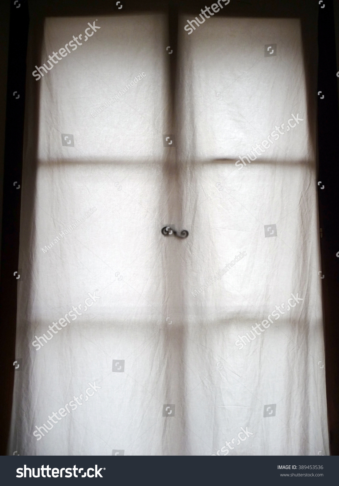 lienz, austria â?? 2010: rustic window with linen curtains in the lienz, austria â?? 2010: rustic window with linen curtains in the