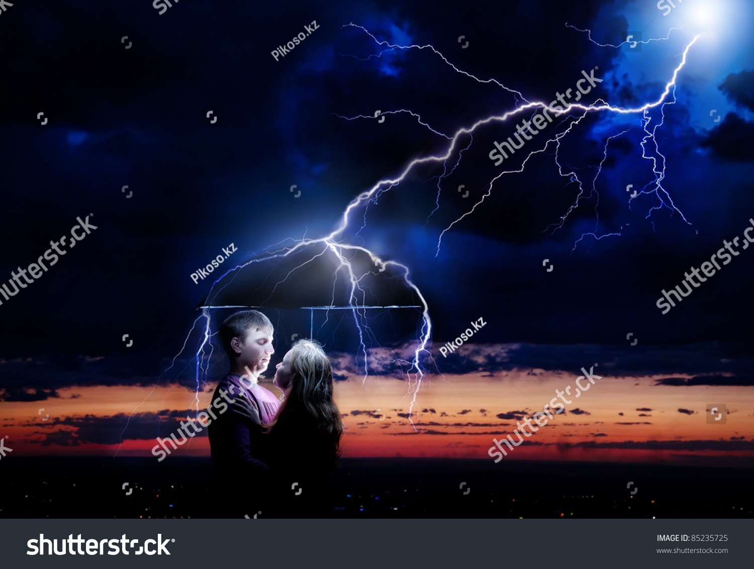 Lighting Strikes Umbrella With Young Couple Under It At Night Storm Sky Background Represents 