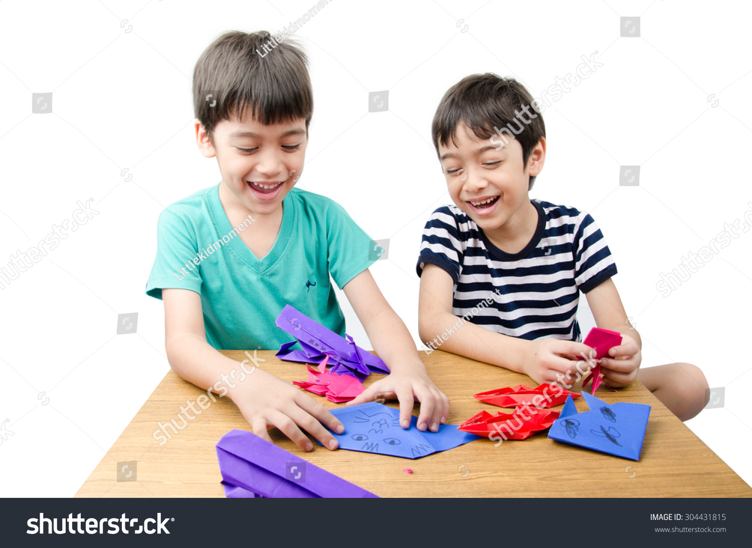 Little boy playing on paper art origami Little boy playing on paper art origami