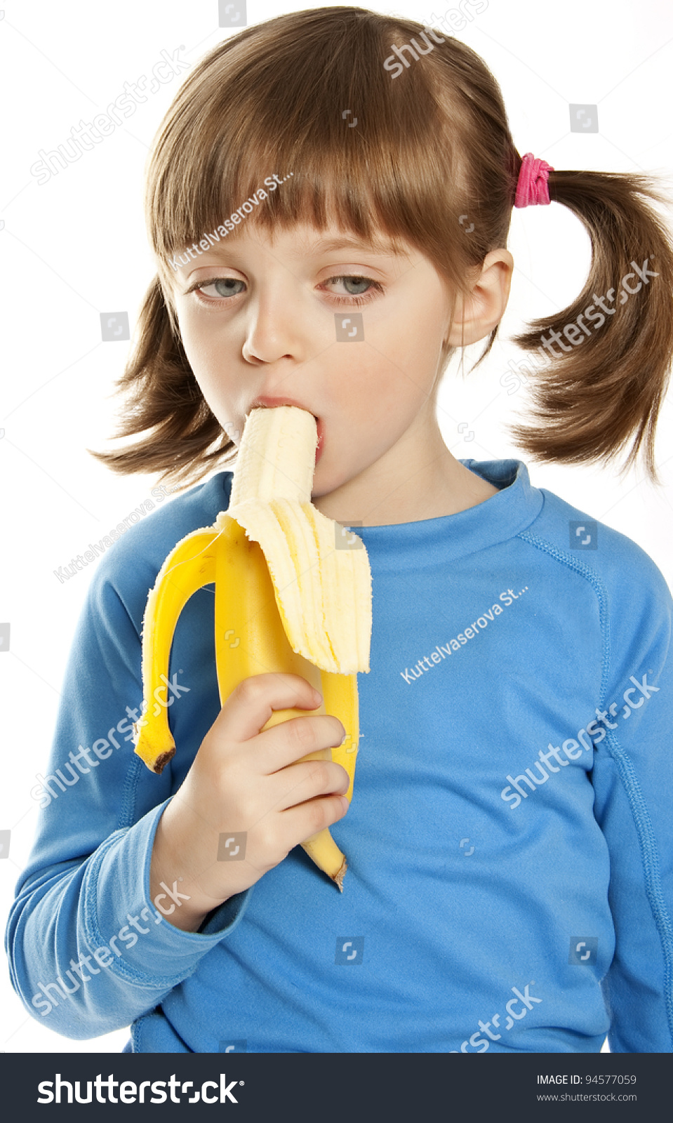 Little Girl Eating Banana Stock Photo 94577059 Shutterstock