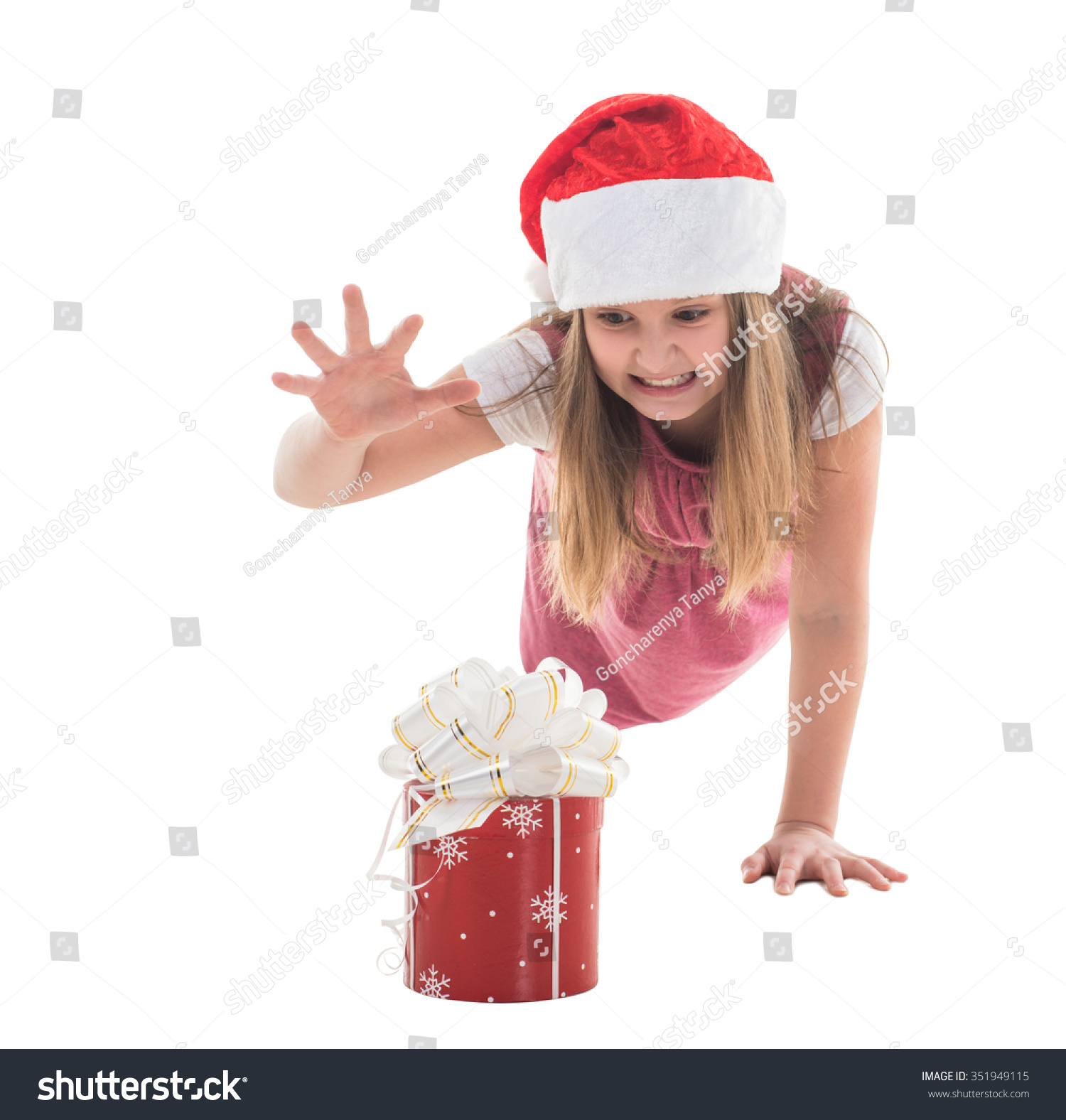 Little girl in the hat of Santa Claus isolated Little girl in the hat of Santa Claus isolated