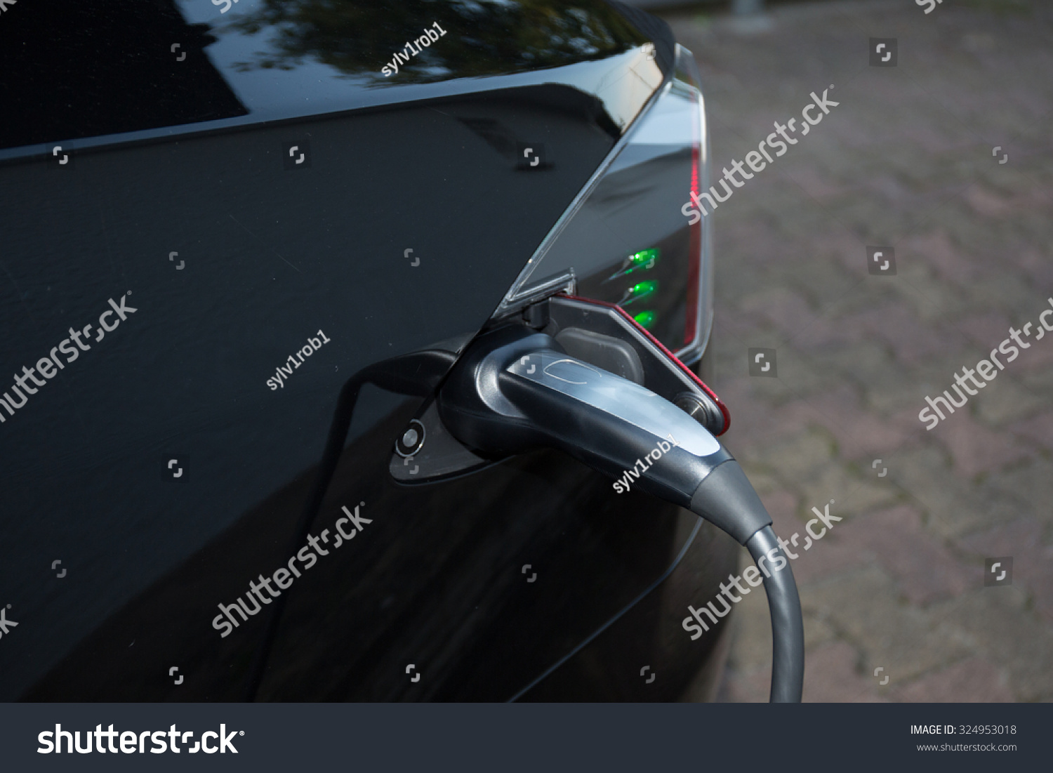 Loading energy of an electric black car Loading energy of an electric black car