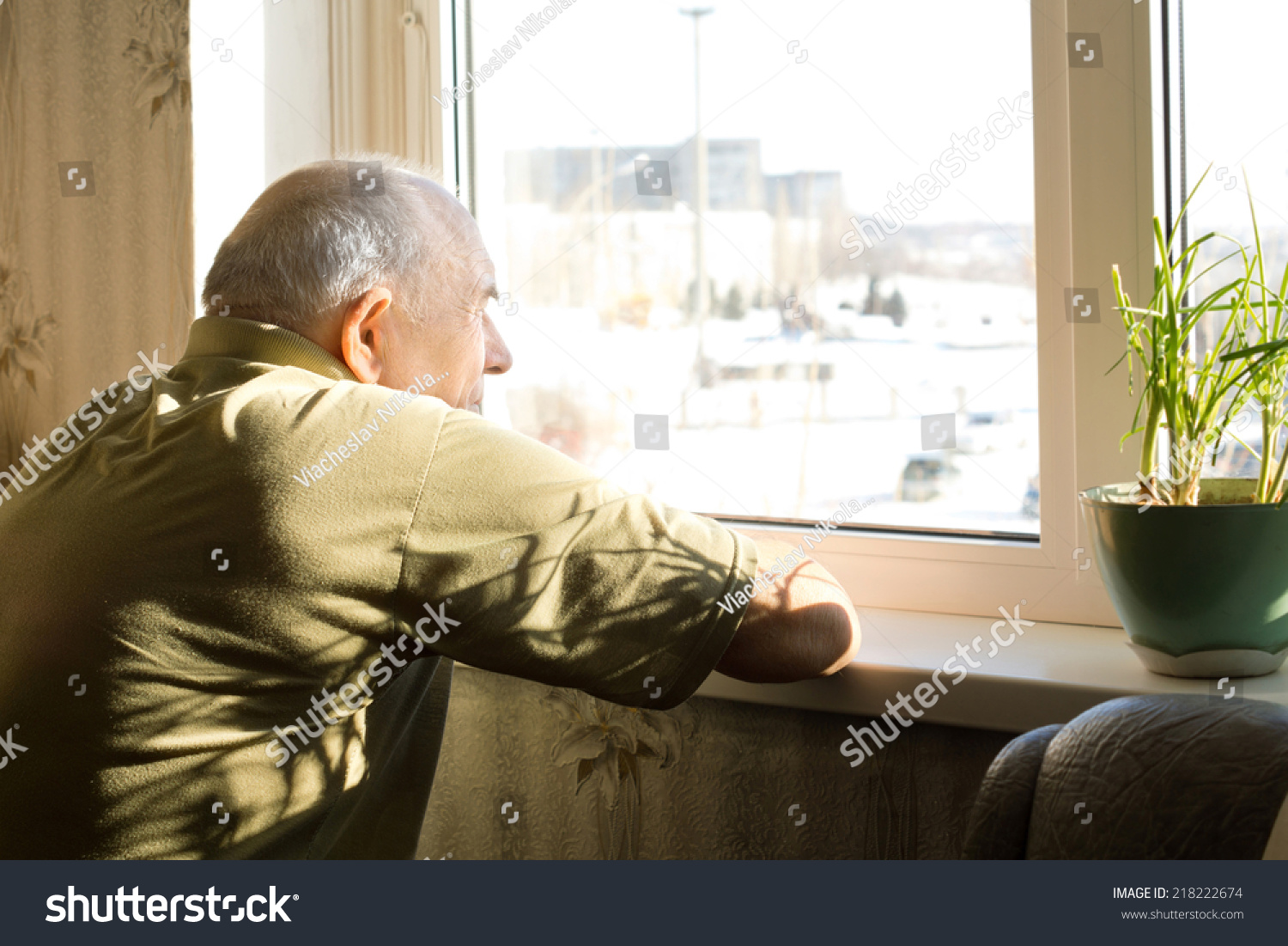http://image.shutterstock.com/z/stock-photo-lonely-old-man-in-an-old-age-home-staring-out-of-a-window-as-he-longs-for-his-freedom-and-friends-218222674.jpg