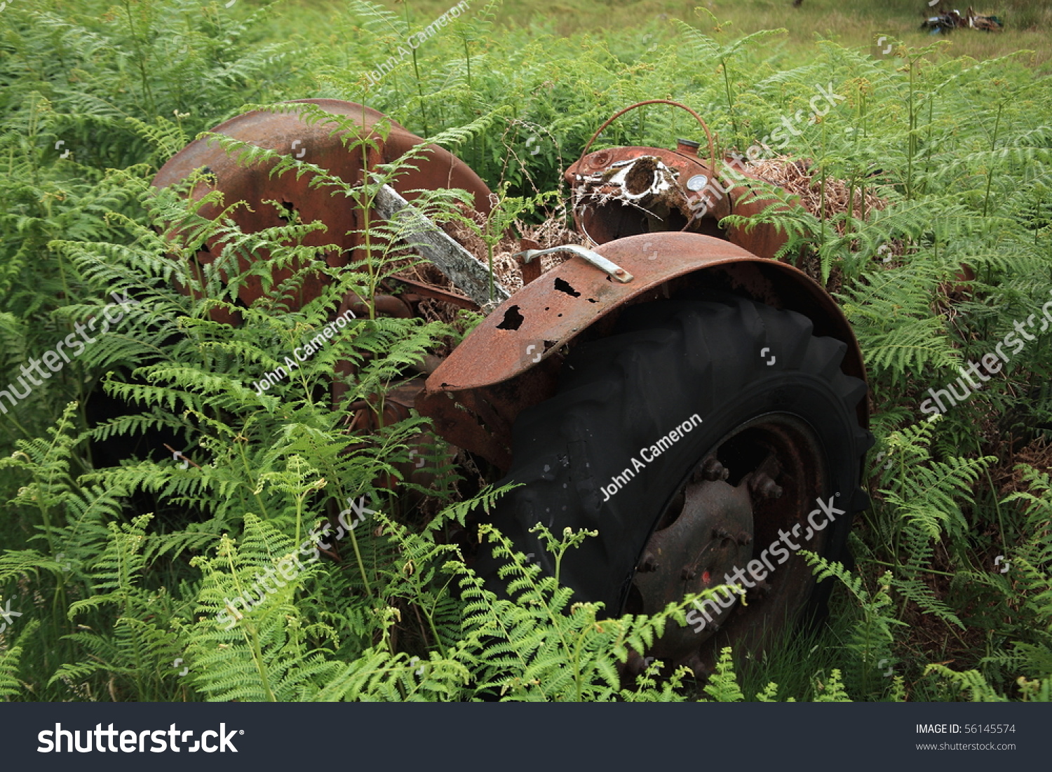 Long Abandoned Rusty Old Tractor In Field Stock Photo 56145574