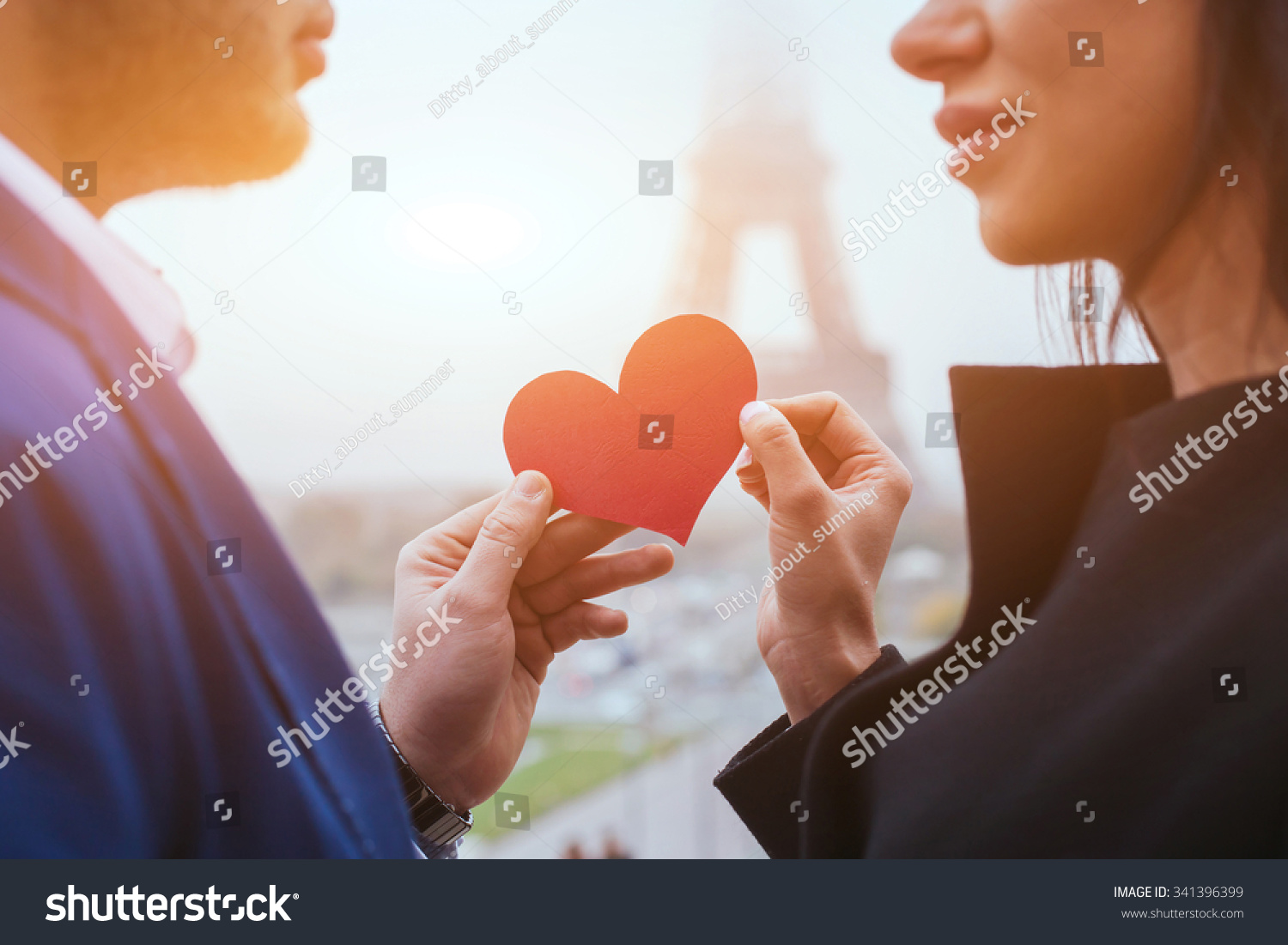 love and romance couple on honeymoon near Eiffel Tower in Paris heart for Valentines day love and romance couple on honeymoon near Eiffel Tower in Paris heart for Valentines day