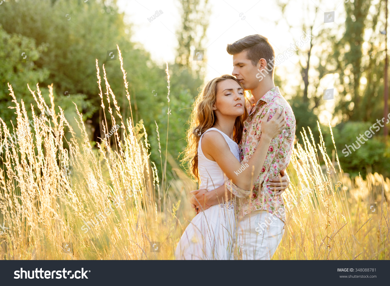 Love And Romance Outdoor Portrait Of Beautiful Loving Couple Embracing