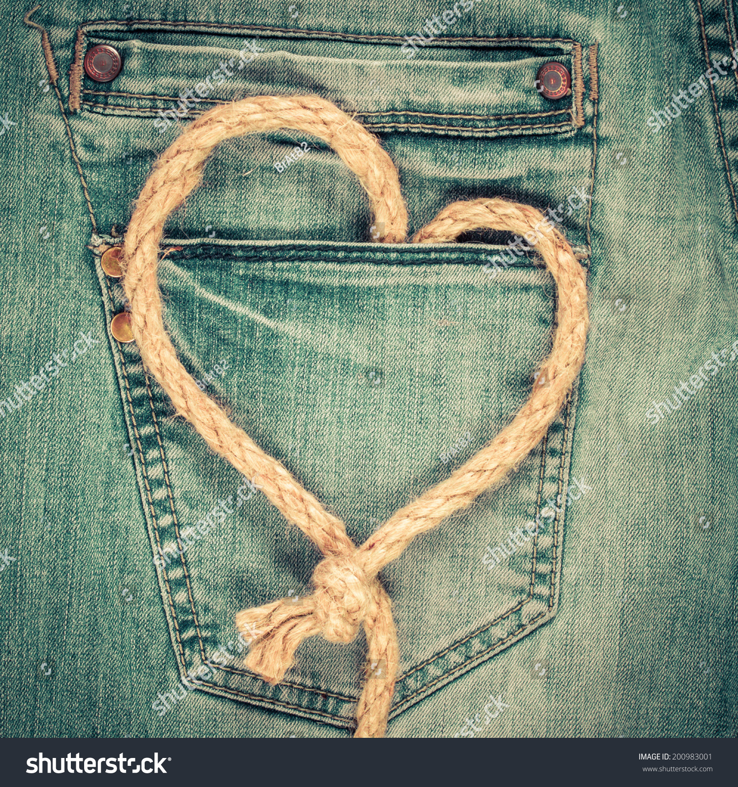 Love Heart Shaped Rope On Denim Jeans Pocket Background. Valentine'S