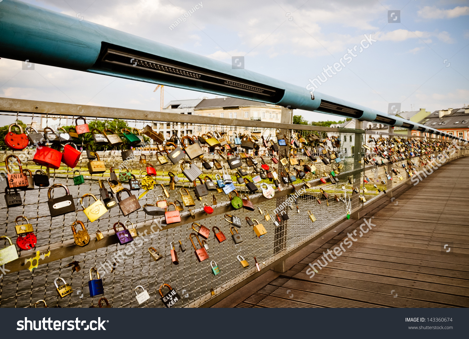 Love Padlocks Bridge. Couples Lock Their Own Padlock And Throws The
