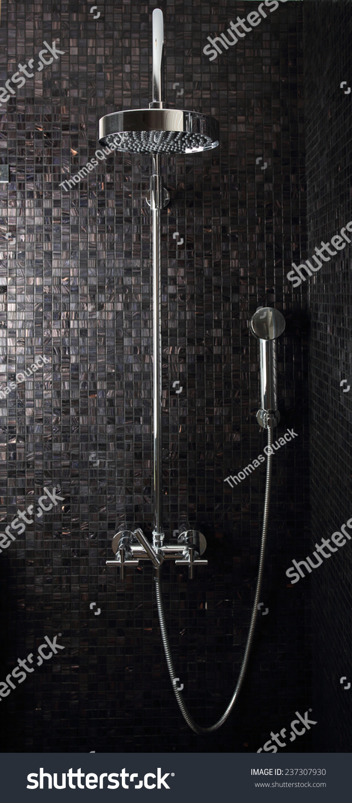 Luxury Rain Shower In Domestic Bathroom Against Italian Glass Mosaics