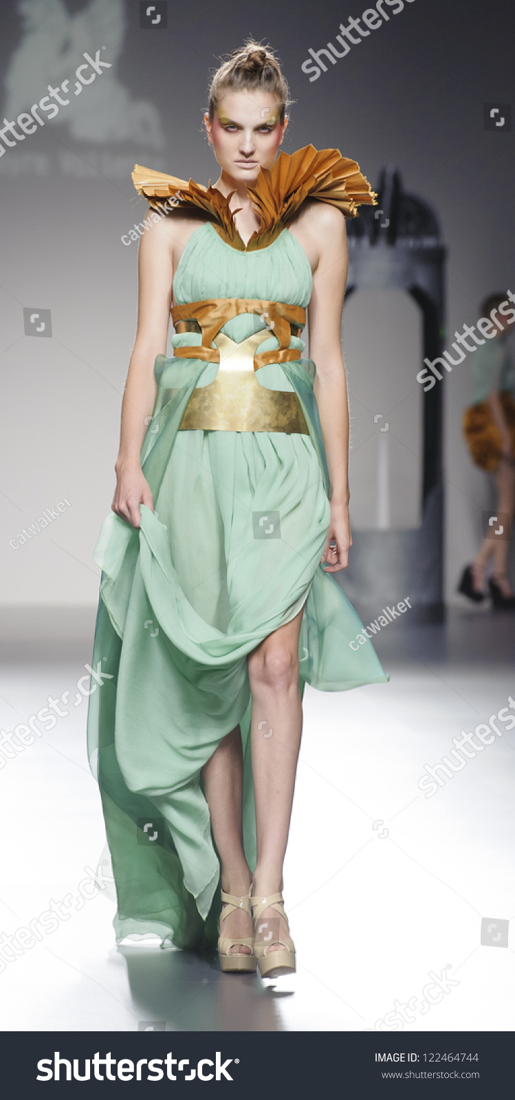 MADRID SEPTEMBER 03 A model walks on the Leyre Valiente catwalk during the Cibeles Madrid Fashion Week runway on September 03 2012 in Madrid Spain MADRID SEPTEMBER 03 A model walks on the Leyre Valiente catwalk during the Cibeles Madrid Fashion Week runway on September 03 2012 in Madrid Spain