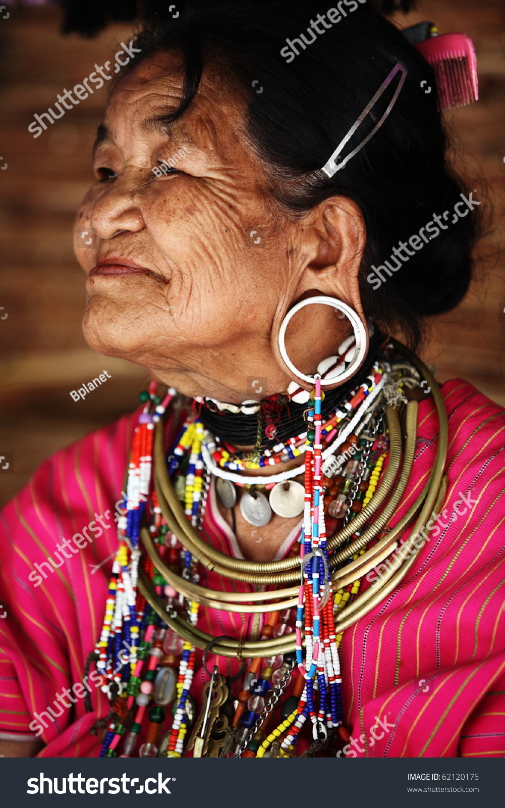 Save to a lightbox - stock-photo-mae-hong-son-thailand-april-old-woman-of-the-big-ear-karen-tribe-sitting-to-be-watched-by-62120176