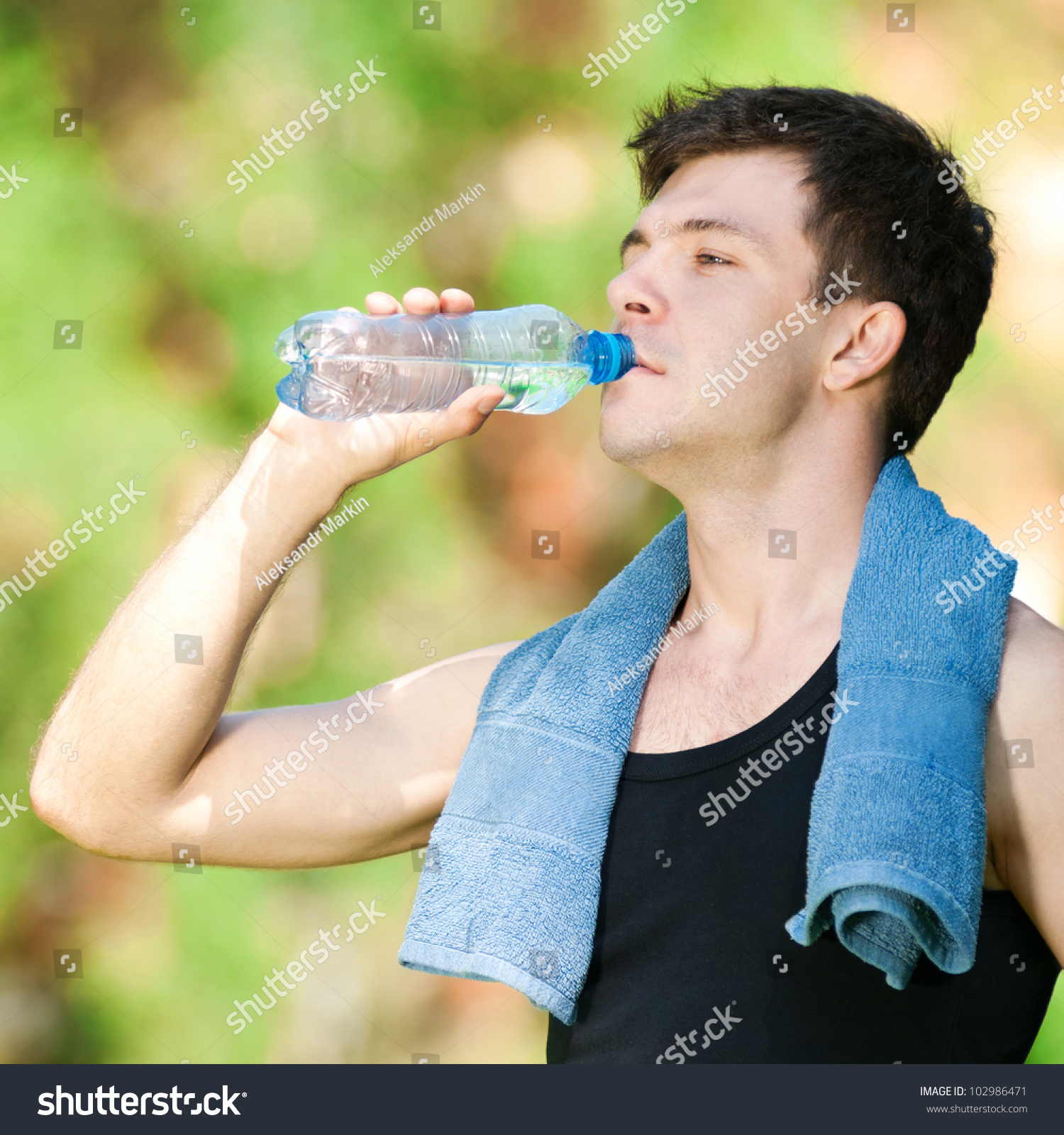 man-drinking-water-after-fitness-exercise-stock-photo-102986471