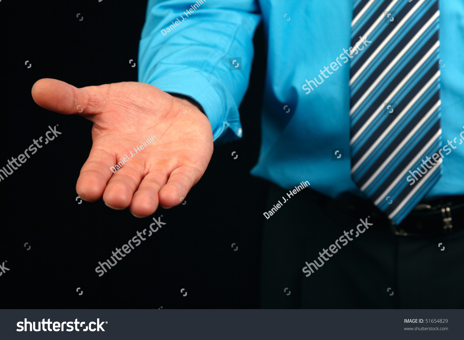 man-extending-his-hand-stock-photo-51654829-shutterstock