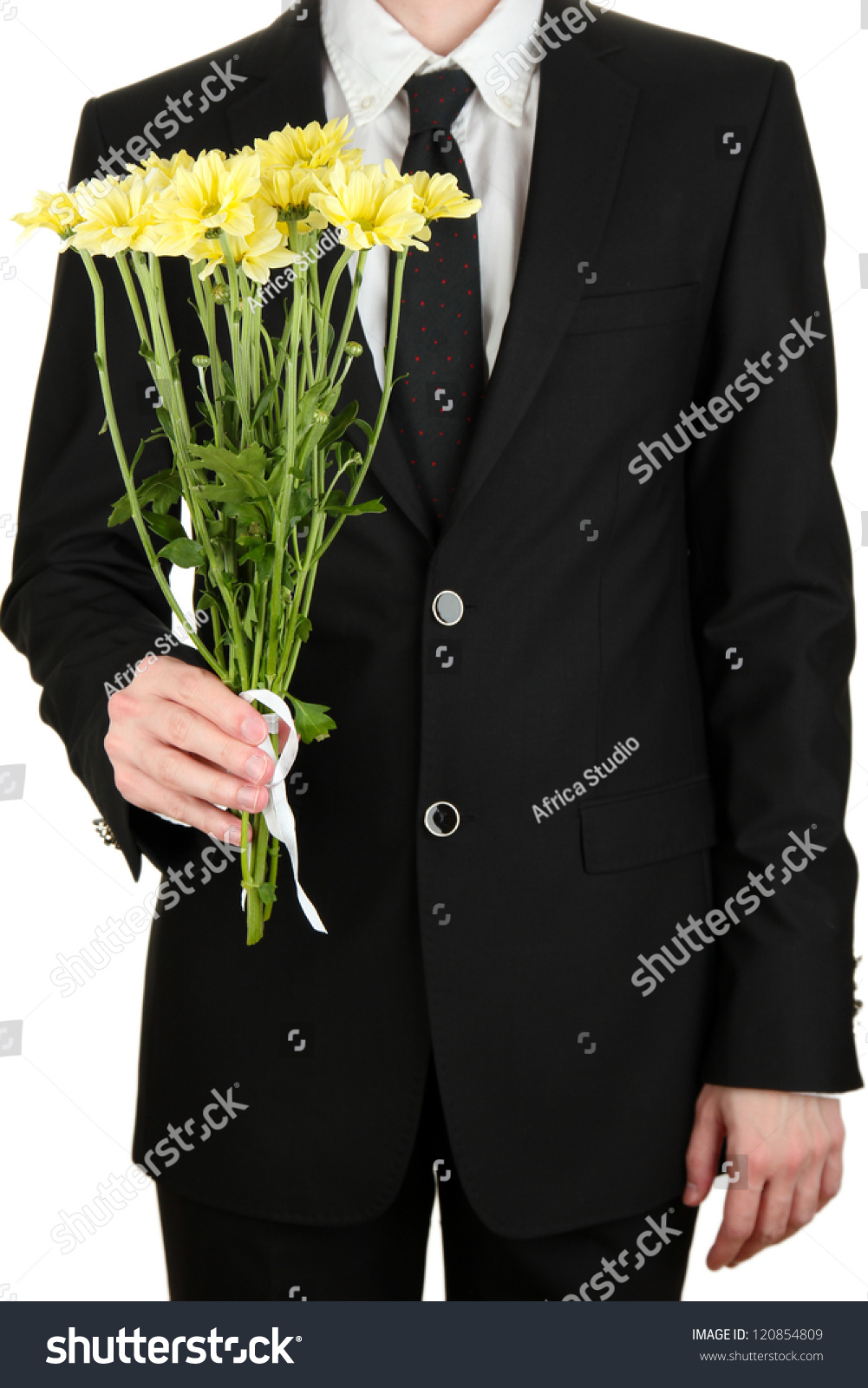 man holding flowers man holding flowers