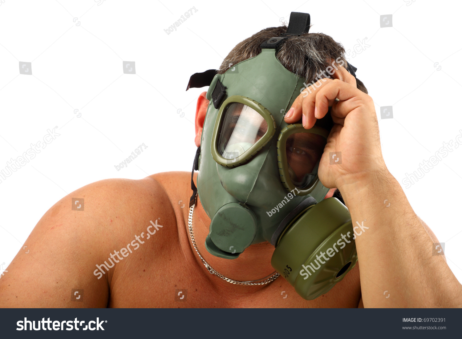 Man In Gas Mask Naked On Top Sitting And Watching Stock Photo 69702391