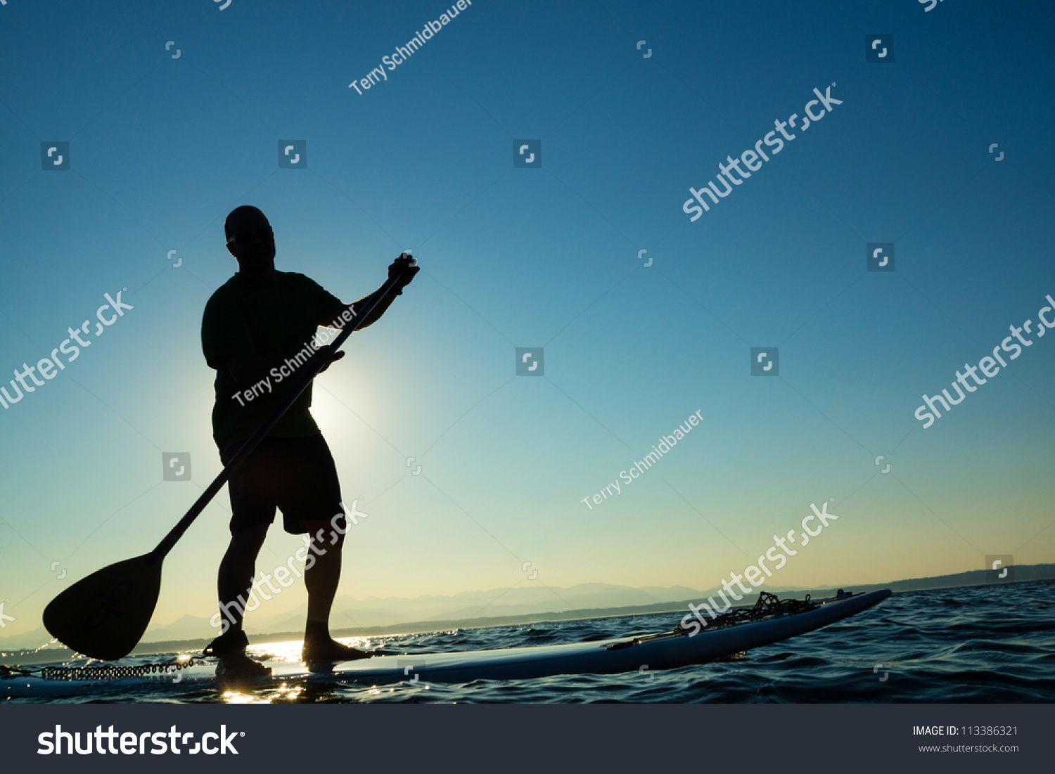 Man On Stand Up Paddle Board Stock Photo Shutterstock