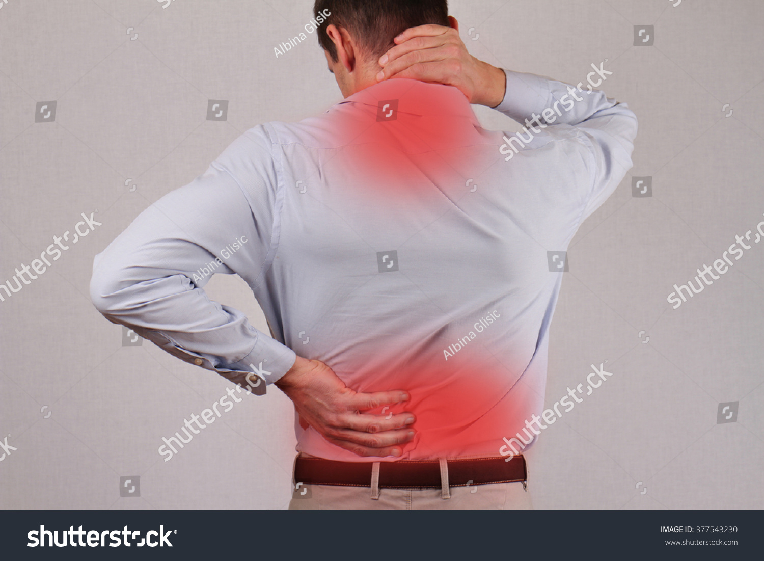 Man Rubbing His Painful Back Close Up Business Man Holdin