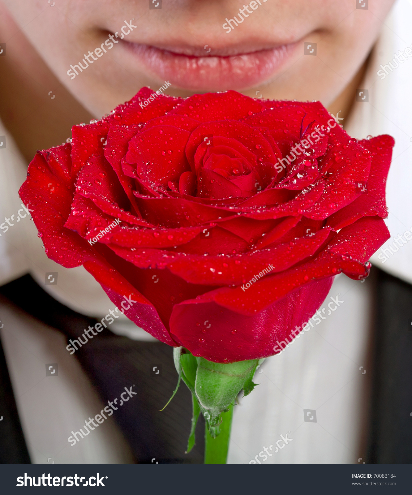 Man Smelling A Rose Stock Photo 70083184 Shutterstock