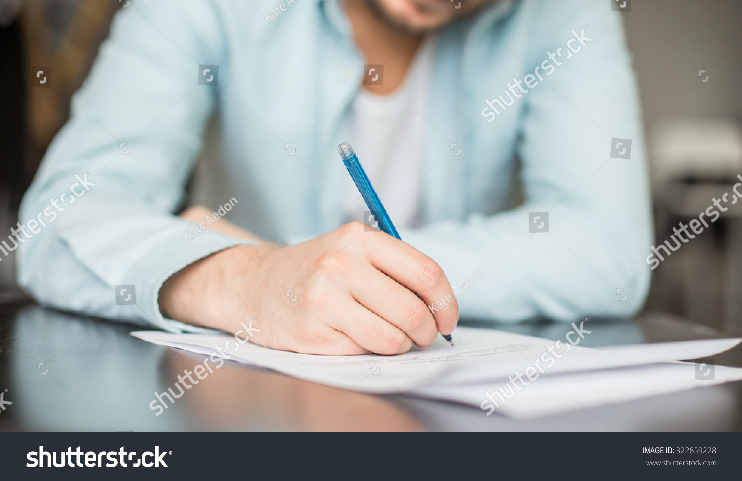 Man Writing At The Desk Stock Photo 322859228 Shutterstock