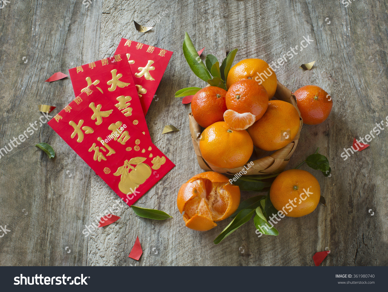 mandarin-oranges-and-chinese-new-year-red-packet-with-text-good-luck