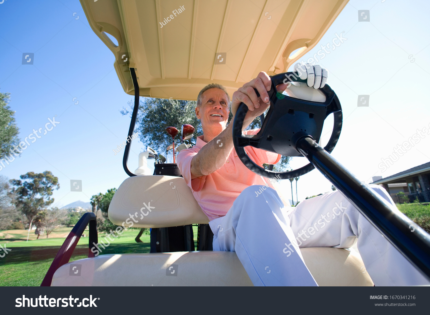 Mature Man Playing Golf Driving Buggy Stock Photo Edit Now 1670341216