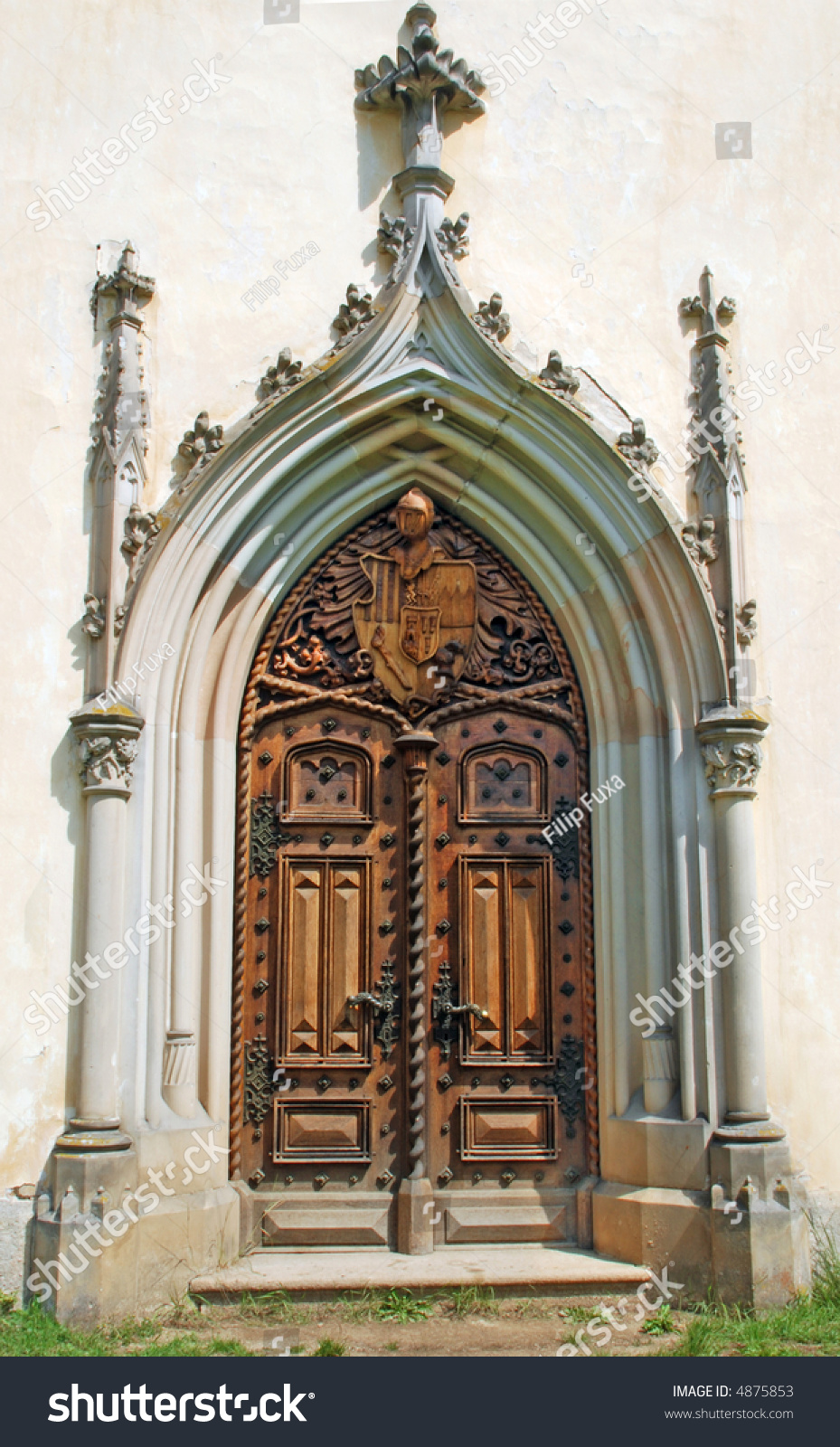 Medieval Gothic Portal With Heraldry Carving Stock Photo 4875853