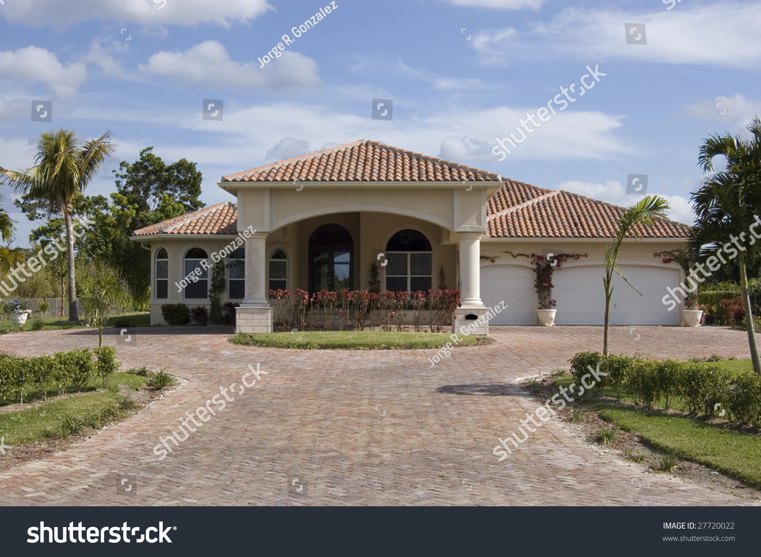 Mediterranean Style Home Showing Driveway And Main ...