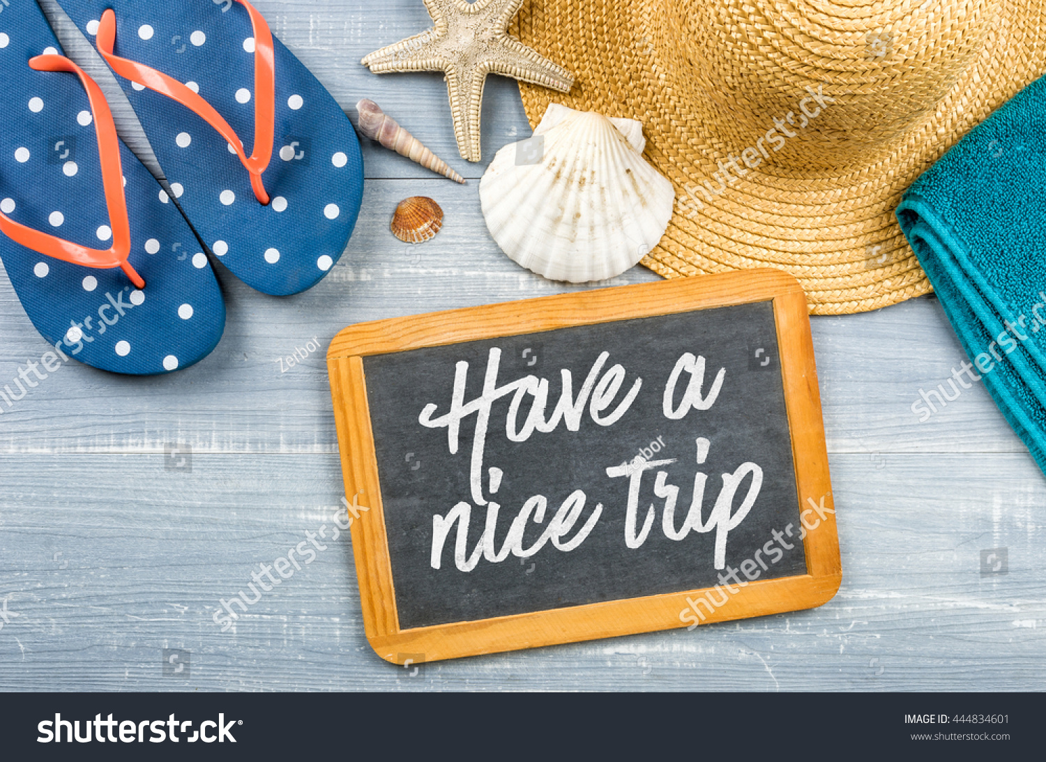 message-on-a-chalkboard-have-a-nice-trip-stock-photo-444834601