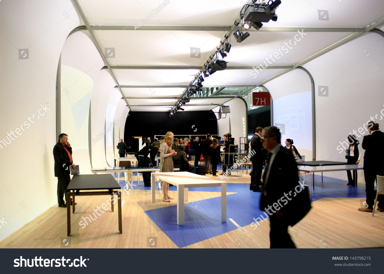 MILAN APRIL 15 People visit design stands at Salone del Mobile international furnishing accessories exhibition April 15 2010 in Milan Italy MILAN APRIL 15 People visit design stands at Salone del Mobile international furnishing accessories exhibition April 15 2010 in Milan Italy
