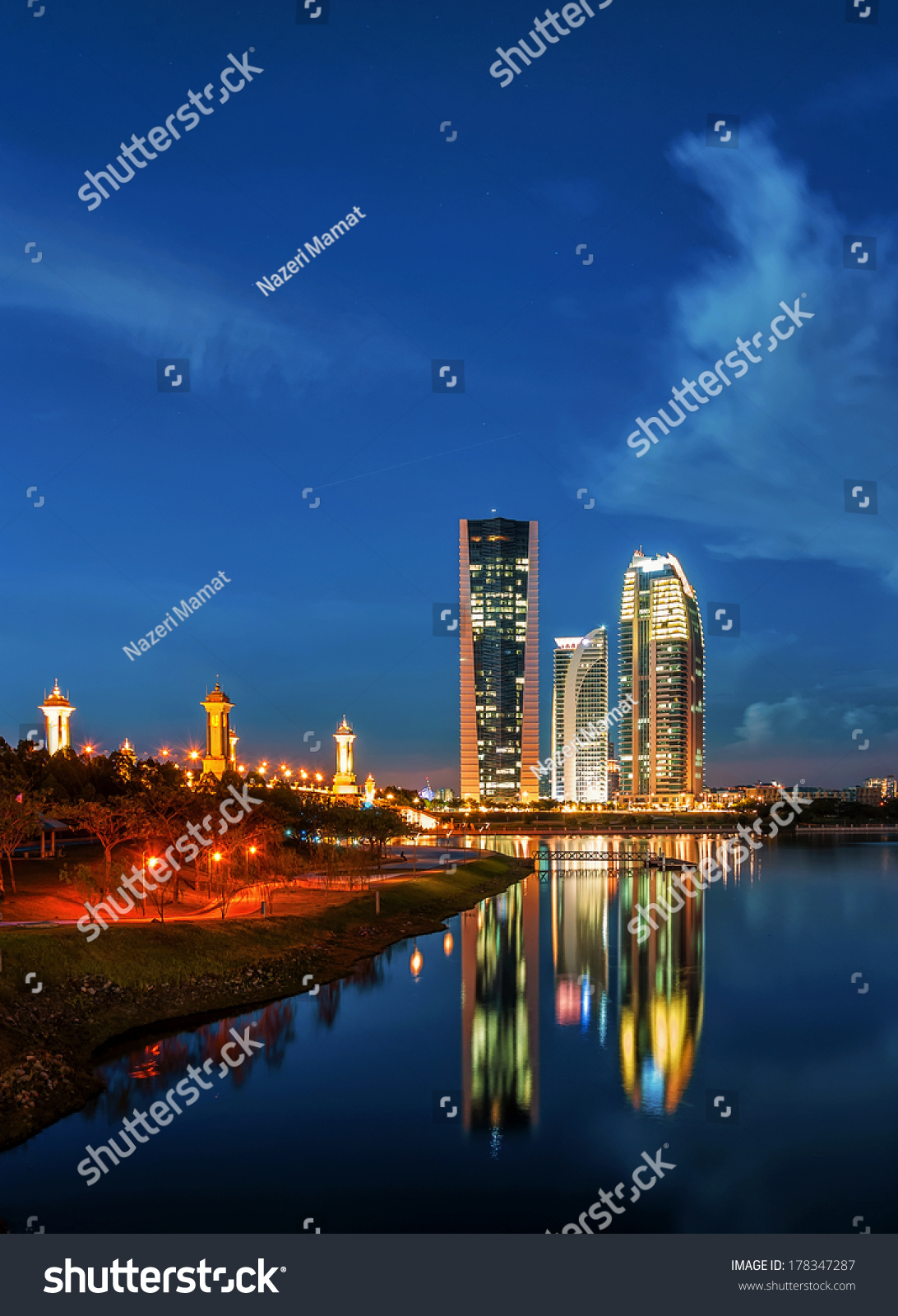 Modern office buildings by Putrajaya Lake Malaysia at sunset Modern office buildings by Putrajaya Lake Malaysia at sunset