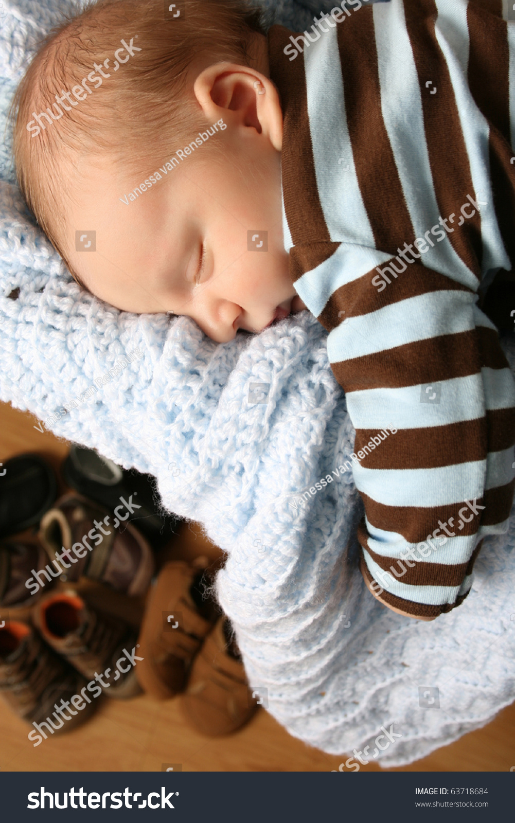 Month Old Baby Boy Sleeping In A Drawer On A Blanket Stock Photo