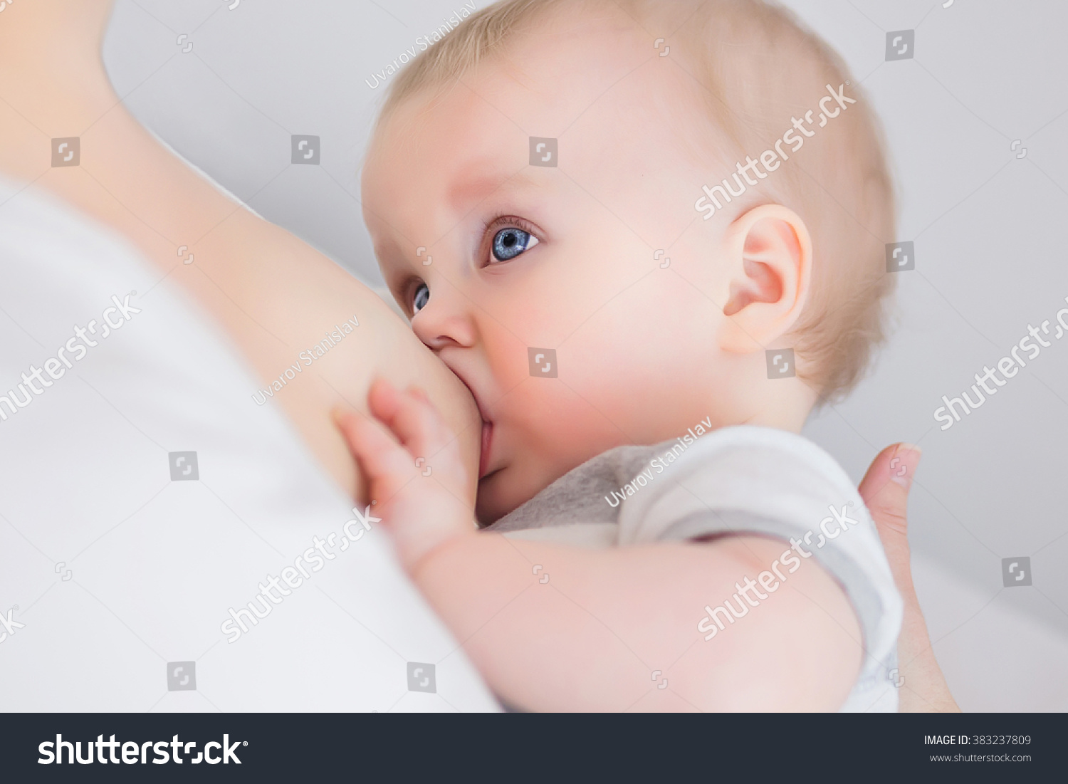 mother feeding breast young mom hugging child shutterstock milk breastfeeding babyboy