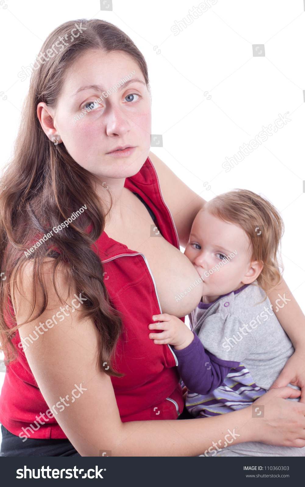 Mother Breast Feeding Her Lit