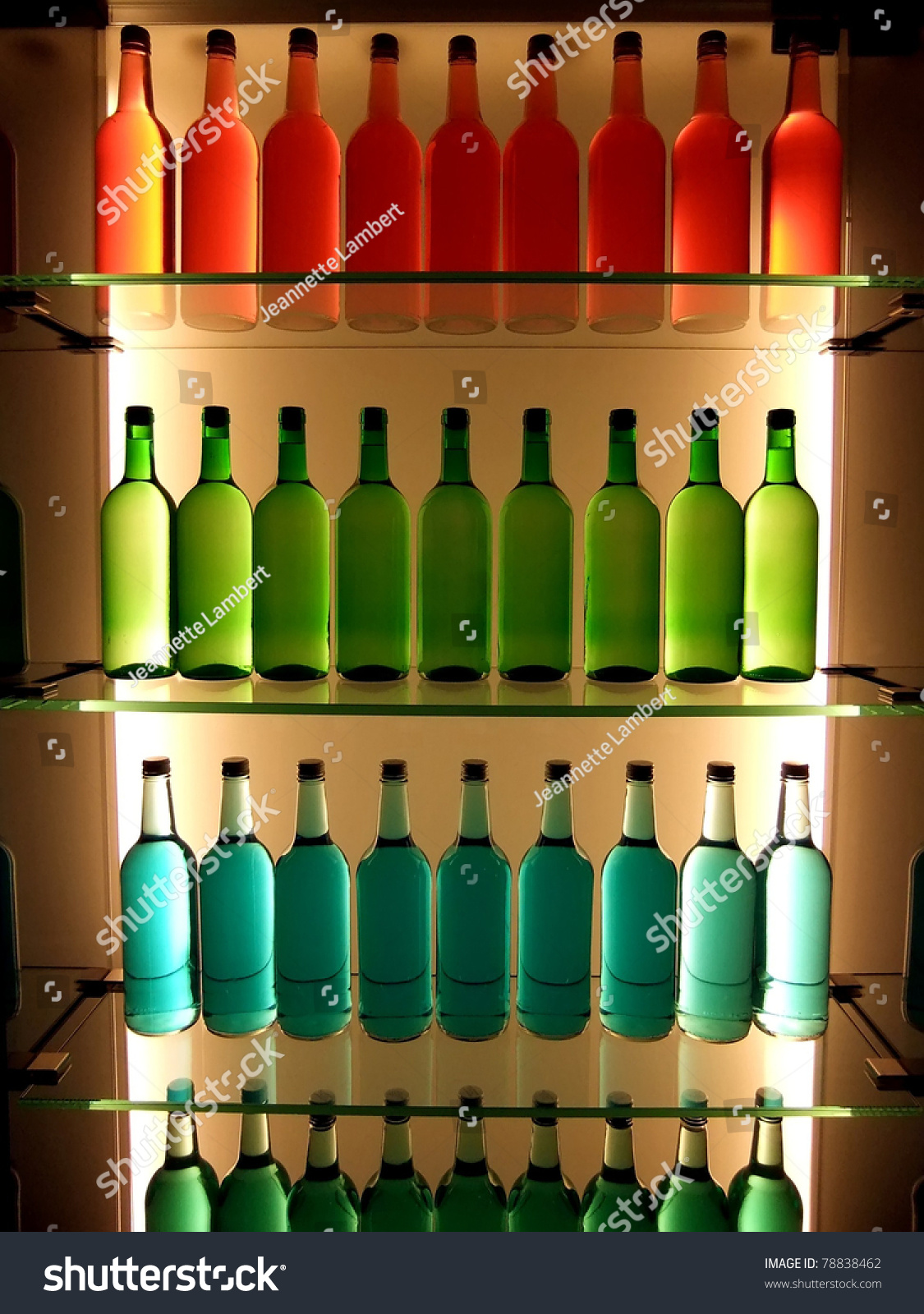 Multi Colored Bottles On Glass Shelves Stock Photo 78838462 Shutterstock