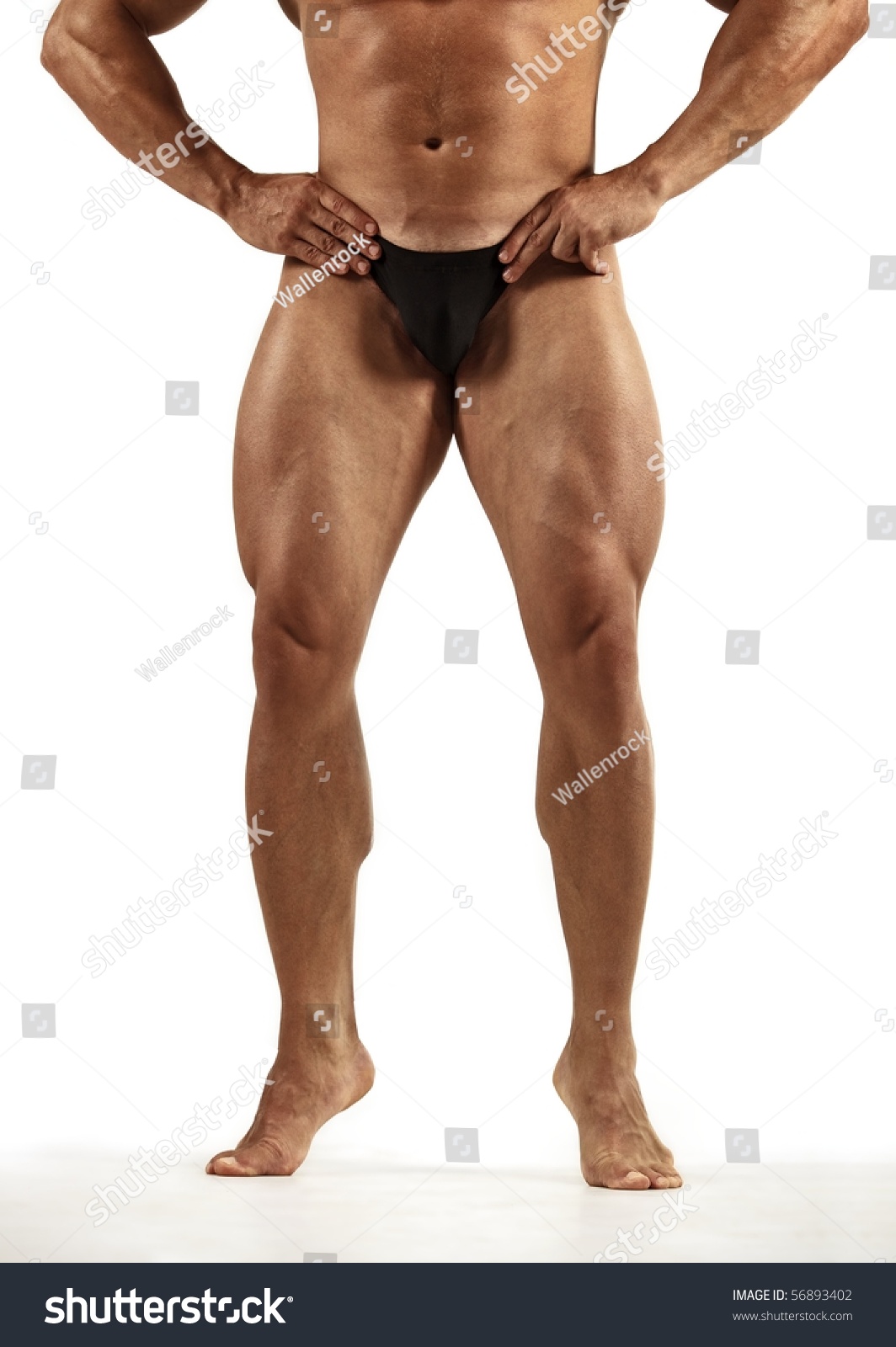 Muscled Legs Of A Male Model On White Background Stock Photo