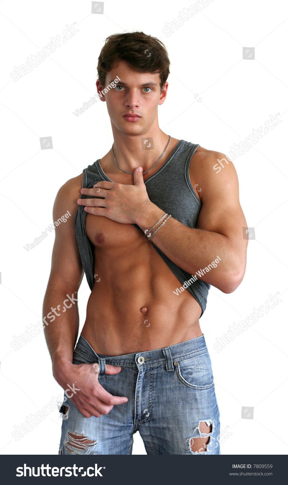 Muscular Sexy Man Showing His Six Packs Isolated On White Stock Photo