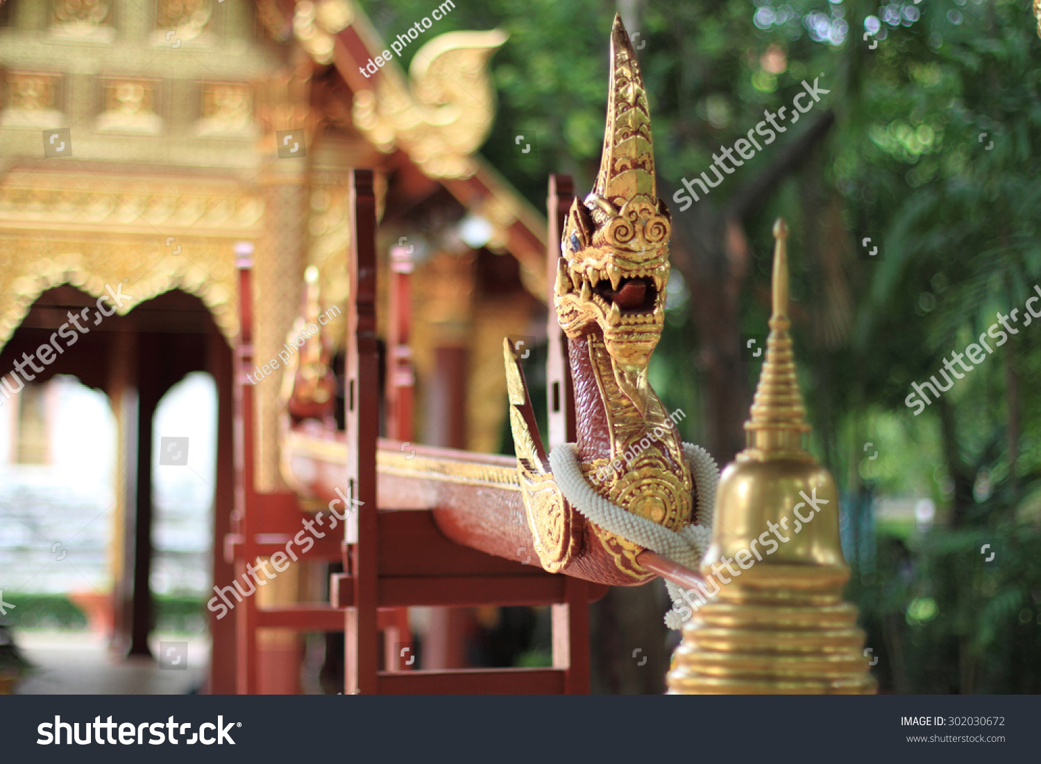 Naga made of wood carving Ancient Thai style art Naga made of wood carving Ancient Thai style art