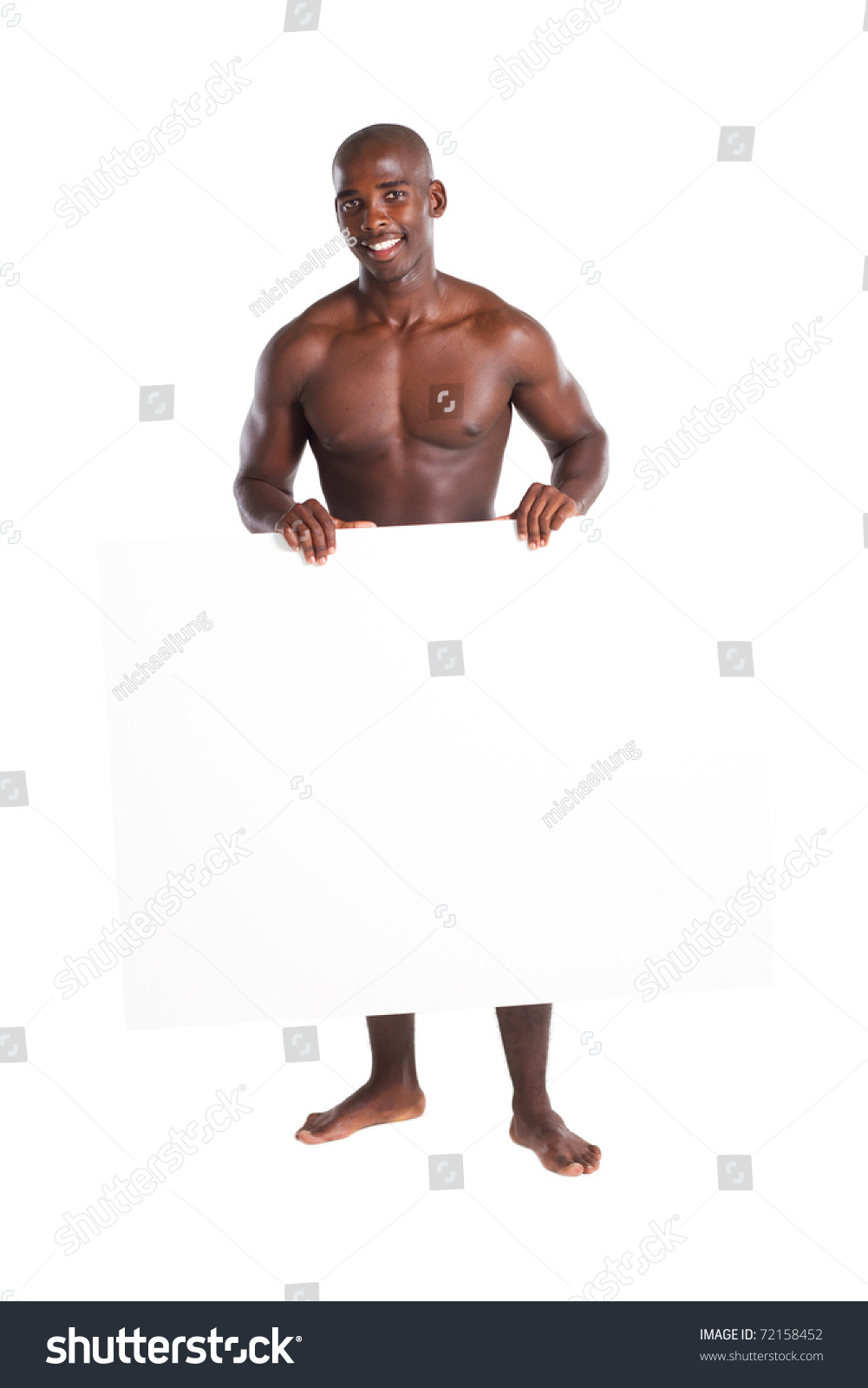 Naked African American Man Holding White Board Stock Photo