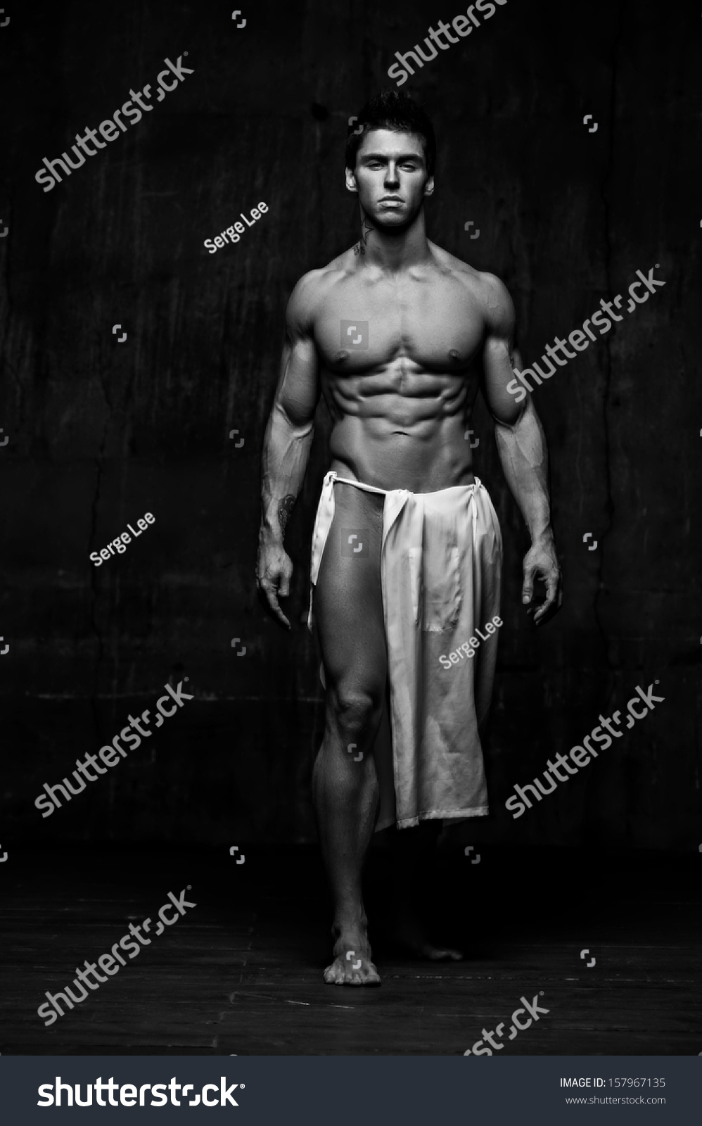 Naked Male Model Against Black Background Stock Photo 157967135