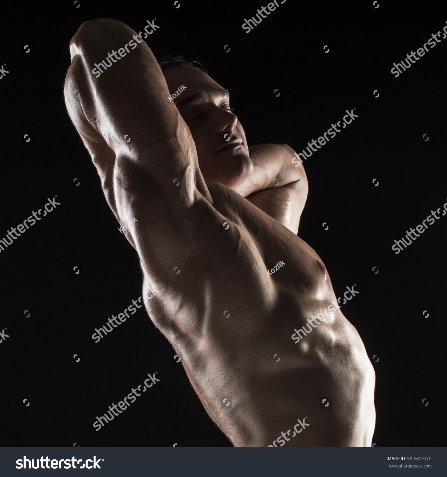 Стоковая фотография 517647079 Naked Torso Male Bodybuilder Athlete