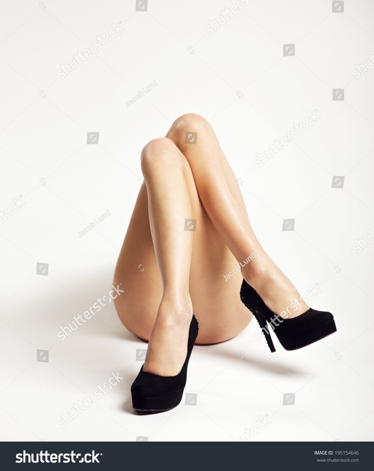 Naked woman on her knees