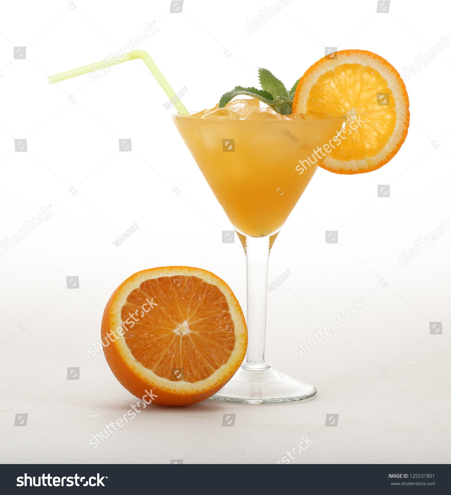 Natural Orange Juice In A Beautiful Graceful Wine Glass On A Thin Leg