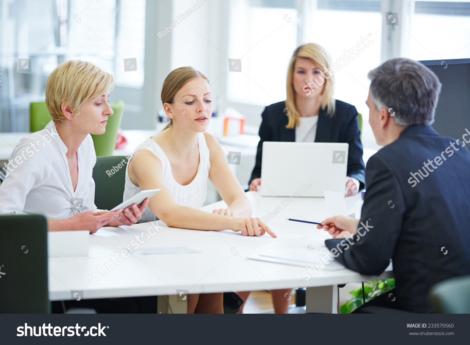 Negotiation In Business Team Meeting In The Office Stock Photo 233570560 Shutterstock