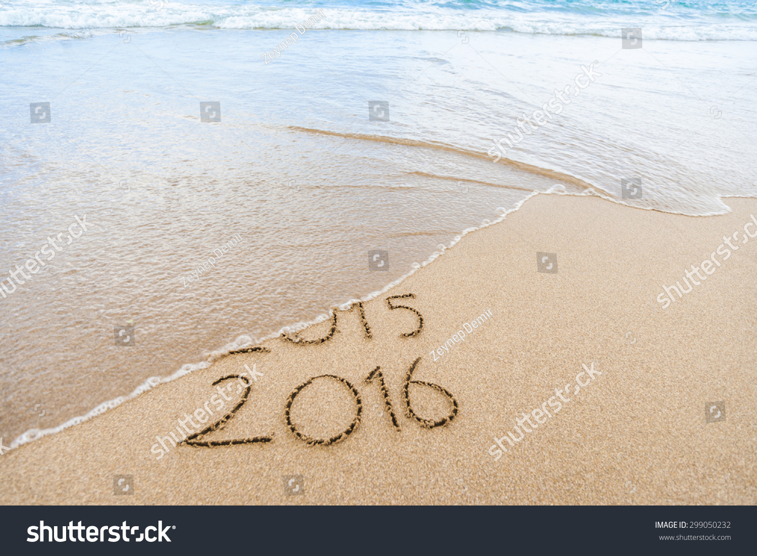 New Year 2016 is coming concept Happy New Year 2016 replace 2015 concept on the sea beach New Year 2016 is coming concept Happy New Year 2016 replace 2015 concept on the sea beach
