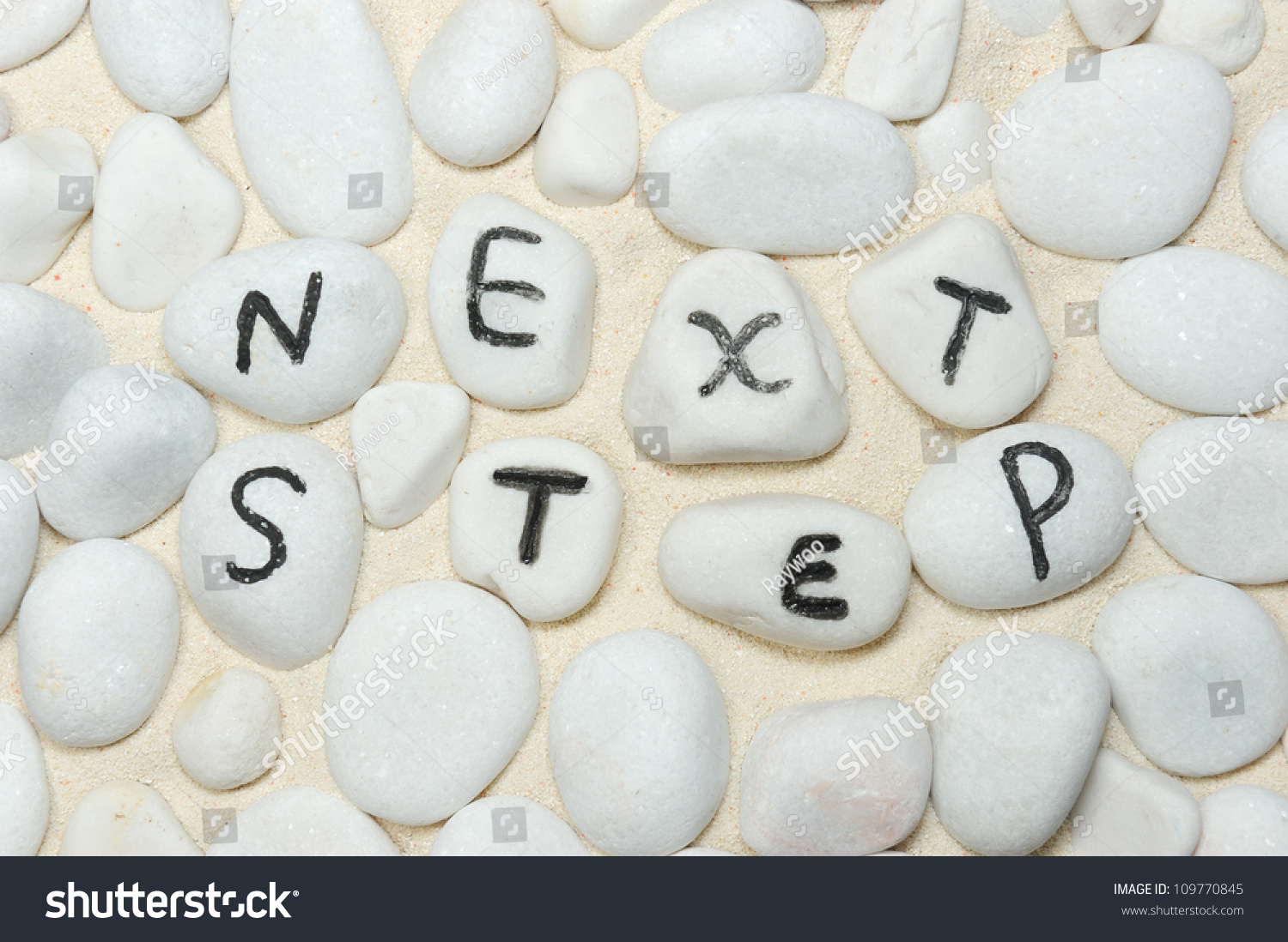 next-step-words-on-group-of-pebbles-stock-photo-109770845-shutterstock