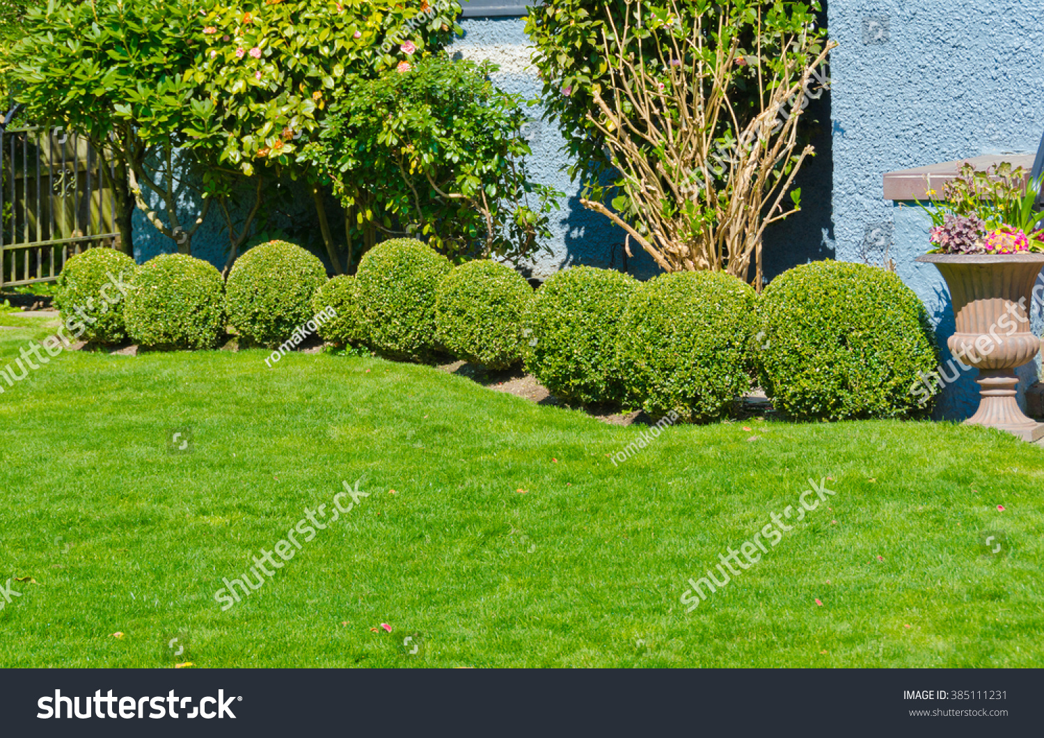 The Front Yard Is Neatly Trimmed And Ready To Be Used As A Flower Bed