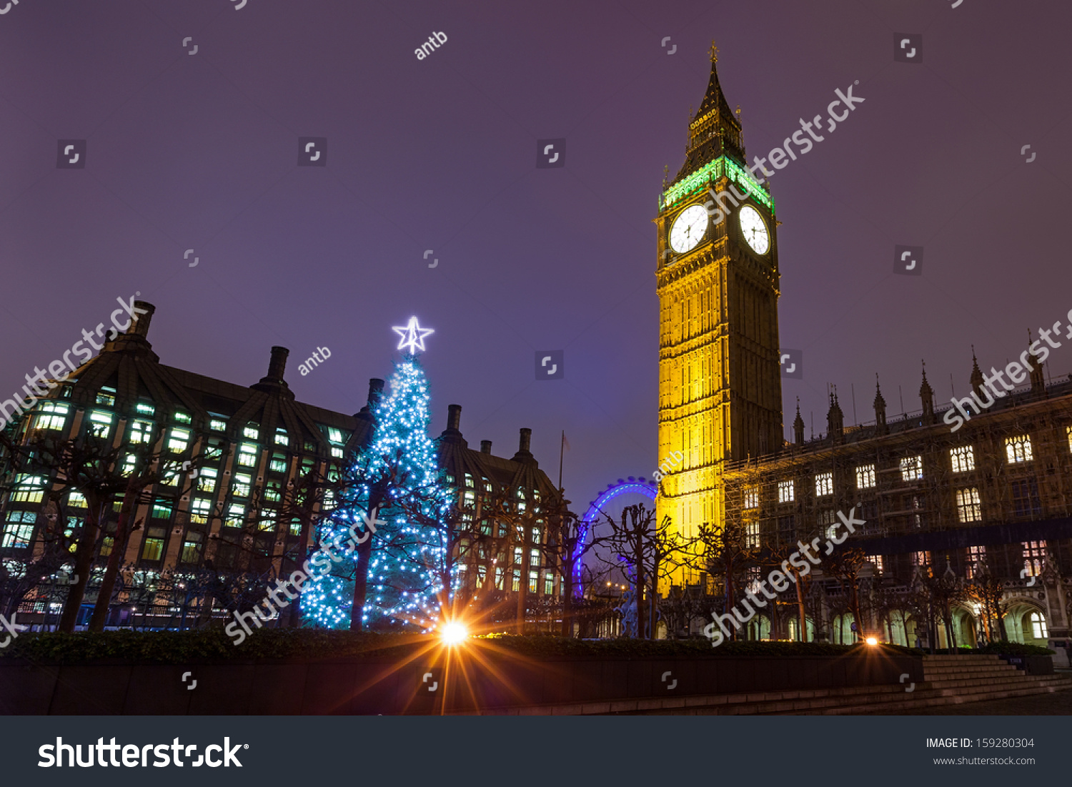 Nighttime View Of The Christmas Tree Outside The Palace Of Westminster